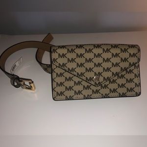 Michael Kors Belt Bag. Brown with MK print. Size small/medium. Brand new